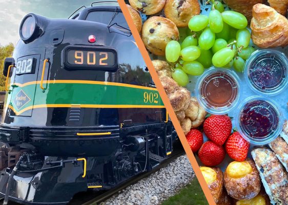 Reading Blue Mountain & Northern locomotive 902 beside a continental breakfast spread with pastries, muffins, grapes, strawberries, and jam.